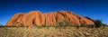 Panoramic view on Uluru, or Ayers Rock, a massive sandstone monolith in the heart of the Northern Territory, Australia Royalty Free Stock Photo